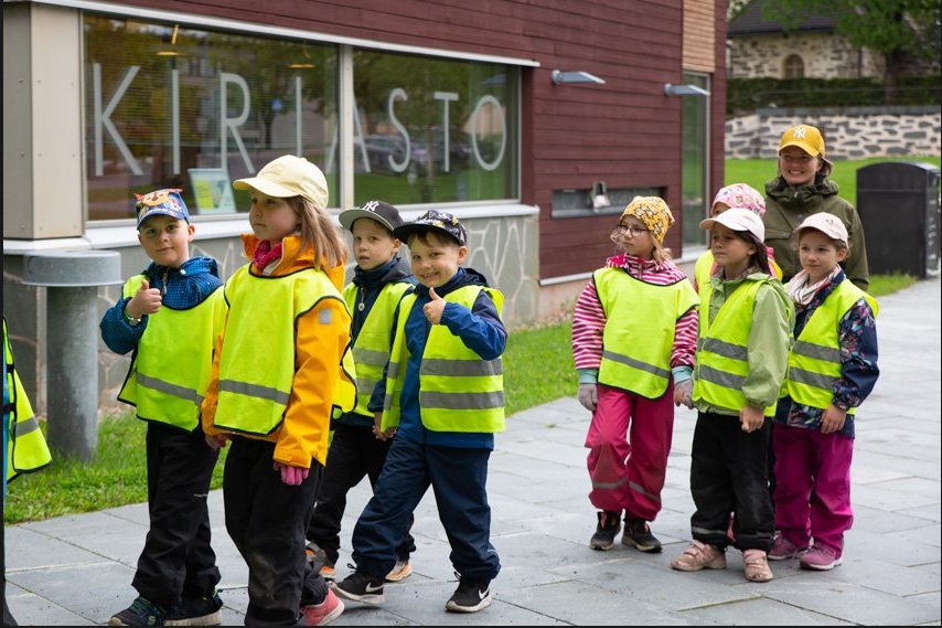 Group of children on they way to library.