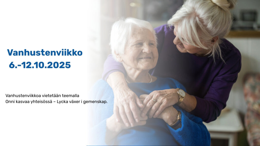 Oikealla kaksi iäkkäämpää ihmistä, joista toinen halaa toista.